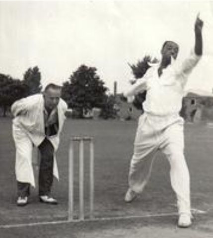 Cricket umpire Frederick Heather (left) calling a game, c. 1937.