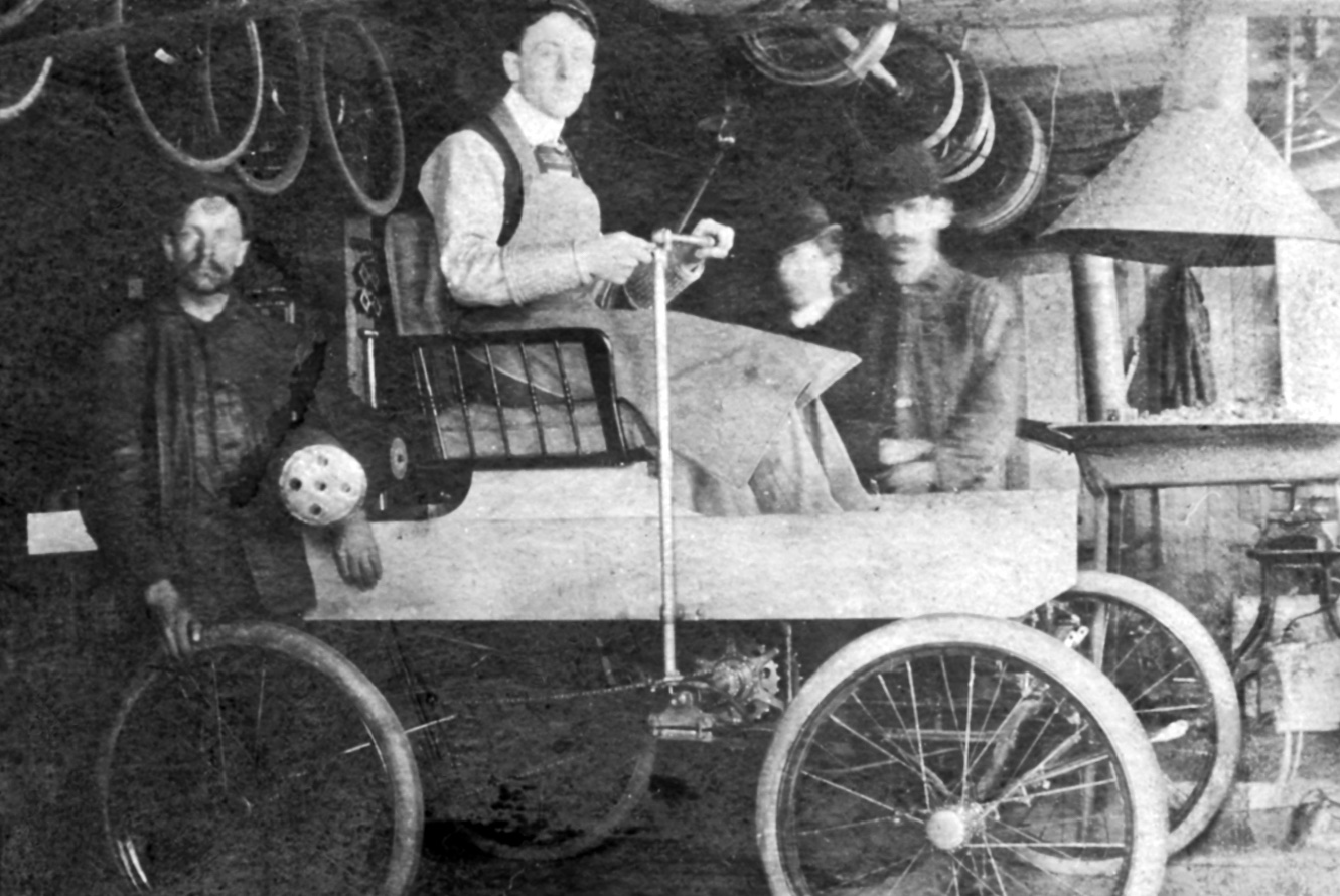 Photographic image of George Foote Foss sitting in the semi-completed Fossmobile Photographic image of George Foote Foss sitting in the semi-completed Fossmobile