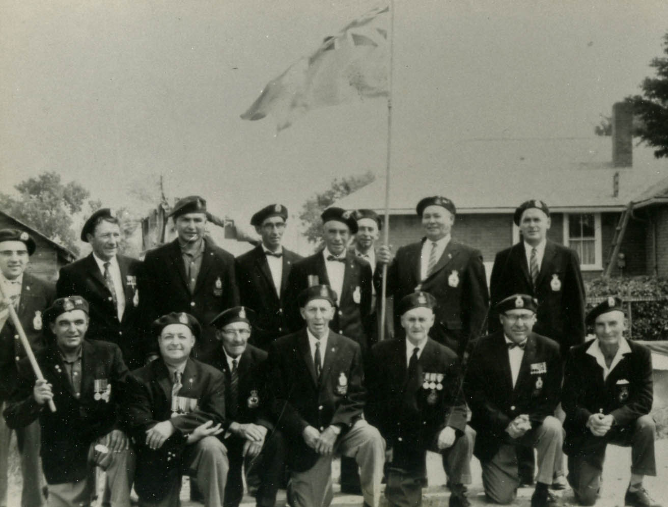 Claude Petit and other Royal Canadian Legion Members on parade. Petit on the upper row, left.