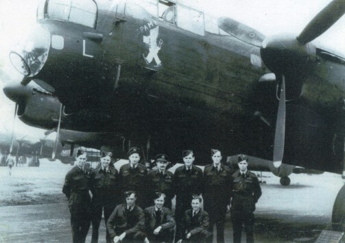 Jack Western (2nd from right, back row) and the 153 Squadron at RAF Station, Scampton Lincolnshire in front of Canadian built Lancaster Mark 10 circa 1945.