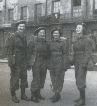 A photo of Lois Cooper and other Welfare Officers.