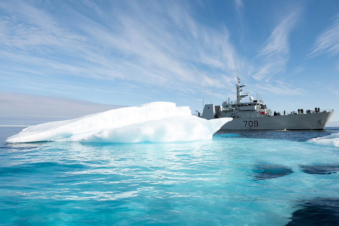 The HMCS Saskatoon maneuvers around ice