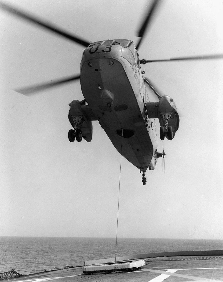 HMCS Assiniboine and Sea King Helicopter