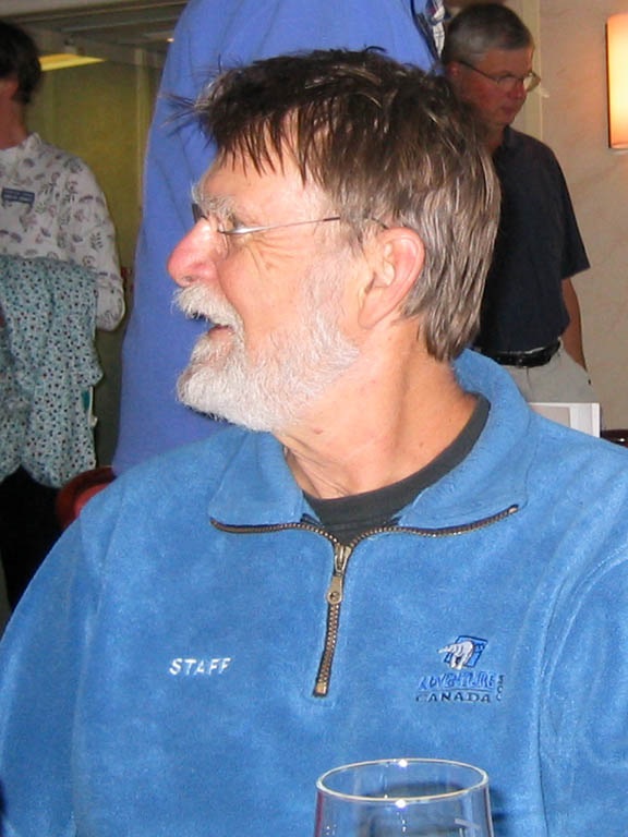 Photograph of Bill Lishman in a blue sweater.
