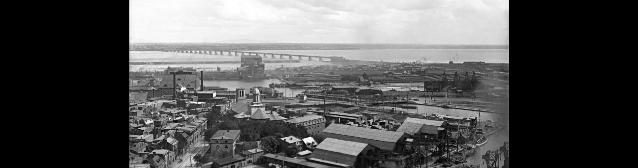 Quartier ouvrier près du canal Lachine à Montréal. À la fin du 19e siècle, des familles d'ouvriers commencent à affluer dans les quartiers situés à proximité des usines. Photo par Wm. Notman & Son, v. 1896.