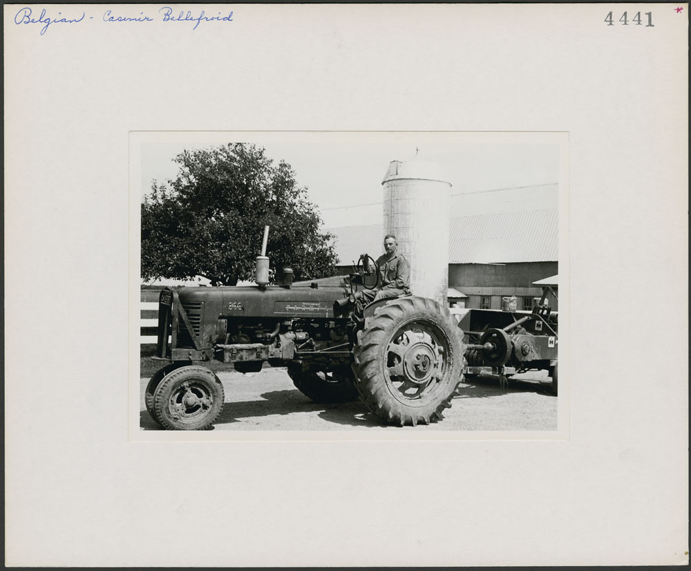 Casimir Bellefroid on a tractor at his farm in Pike River, Missiquoi County, Quebec. 