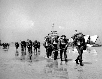 Canadian soldiers landing on Juno Beach, Courseulles-sur-Mer, France, June 6th, 1944.