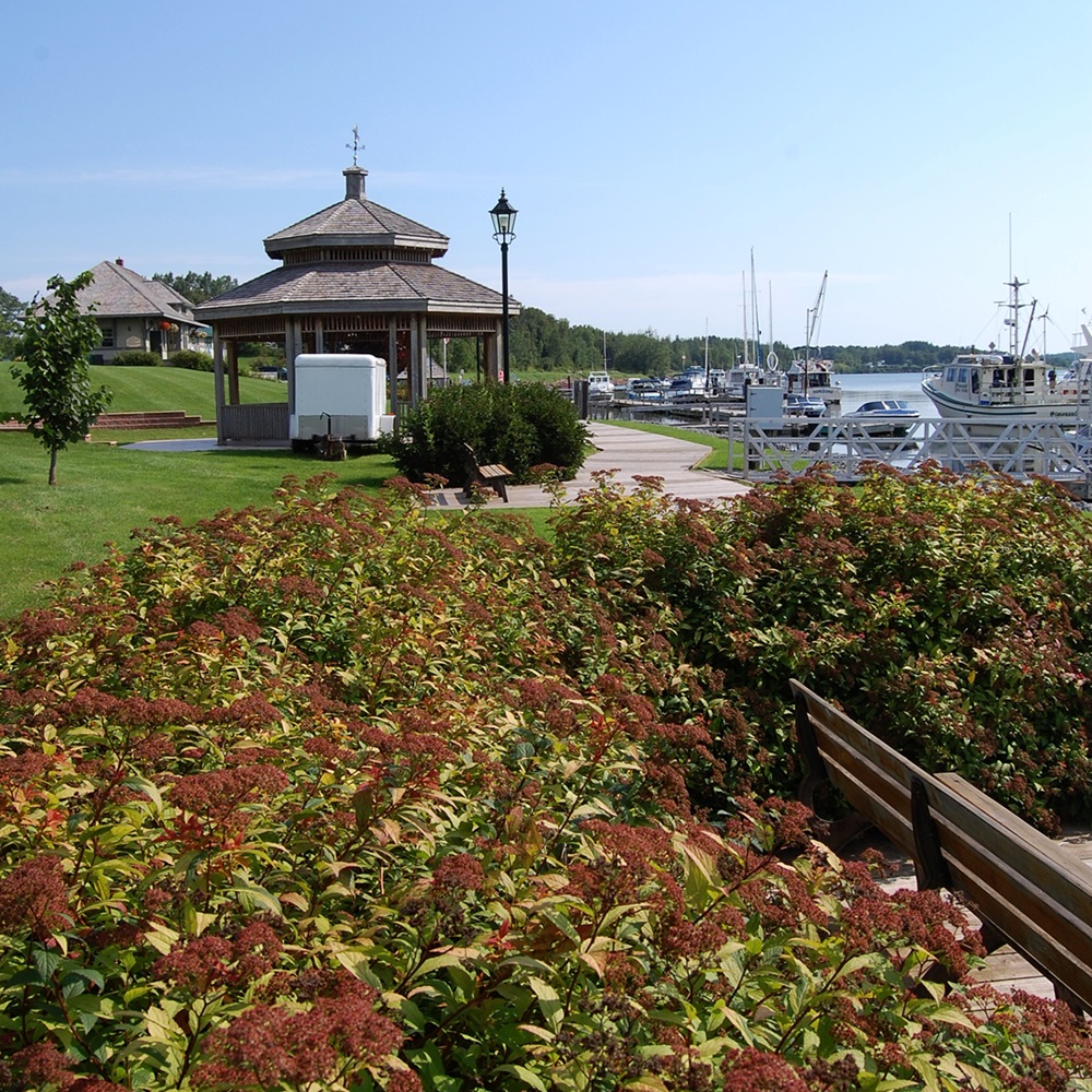 Montague Waterfront Riverfront Park in Montague, PEI. The old train station is on the left, and a marina is on the right.